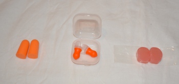 From left: foam earplugs -totally useless; rubber air pressure earplugs - somewhat useful; silicone swimming earplugs - just right